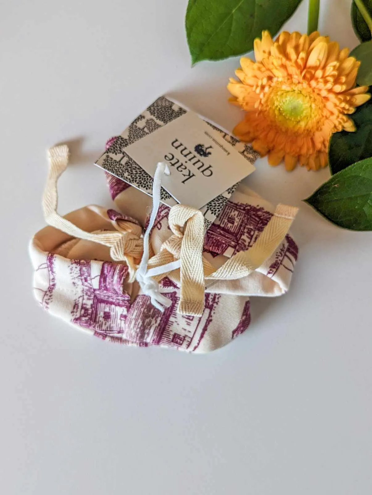 Kate Quinn Cloth Tie Booties in a Rustic Cabin Print (0-3m)